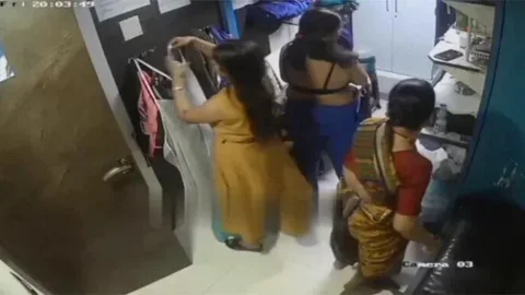 Desi Milf's Changing Clothes Captured In CCTV Cam