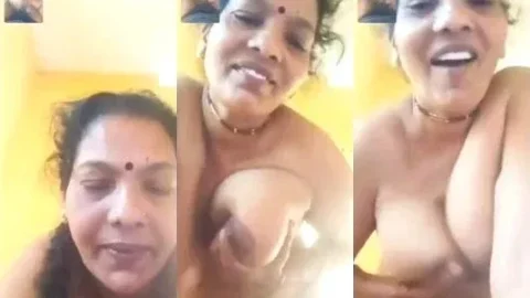 Leaked VC of Horny Desi Bhabhi Squeezing Her Huge Milky Boobs