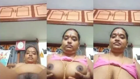 Leaked Tamil Aunty Nude Show Squeezing Her Massive Boobs And Hard Nipples