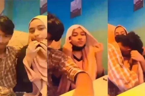 Restaurant Young Boy Enjoying With His Hijabi GF In